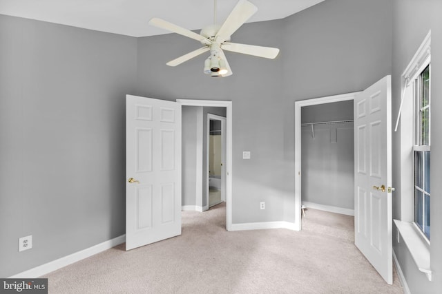 20580 Willoughby Sq, Sterling, VA 20165 - unfurnished bedroom with carpet floors, a closet, a high ceiling, baseboards, and ceiling fan
