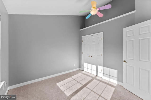 20580 Willoughby Sq, Sterling, VA 20165 - unfurnished bedroom with carpet flooring, baseboards, a closet, lofted ceiling, and ceiling fan