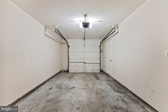 20580 Willoughby Sq, Sterling, VA 20165 - garage featuring a garage door opener