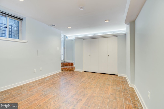 1726 U St NW Unit 1, Washington, DC 20009 - unfurnished bedroom featuring wood finished floors, recessed lighting, a closet, and baseboards