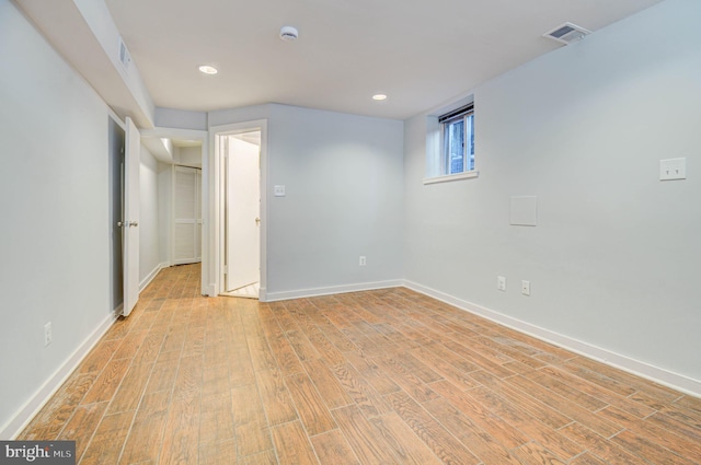 1726 U St NW Unit 1, Washington, DC 20009 - empty room with light wood finished floors, baseboards, a smoke detector, and recessed lighting