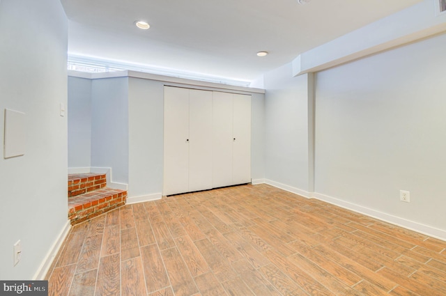 1726 U St NW Unit 1, Washington, DC 20009 - finished basement with wood finished floors, baseboards, and recessed lighting