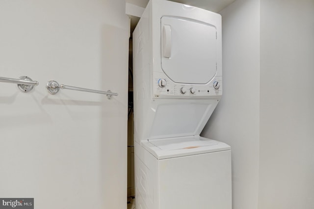 1726 U St NW Unit 1, Washington, DC 20009 - washroom featuring stacked washer / dryer