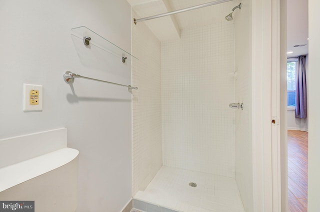 1726 U St NW Unit 1, Washington, DC 20009 - full bathroom featuring wood finished floors and a tile shower
