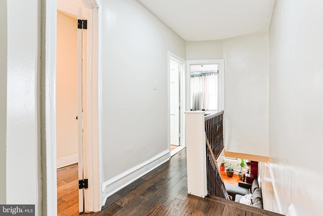 4719 Rorer St, Philadelphia, PA 19120 - hallway featuring wood finished floors, an upstairs landing, and baseboards
