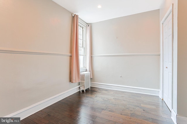 4719 Rorer St, Philadelphia, PA 19120 - unfurnished room with radiator heating unit, wood finished floors, baseboards, and recessed lighting