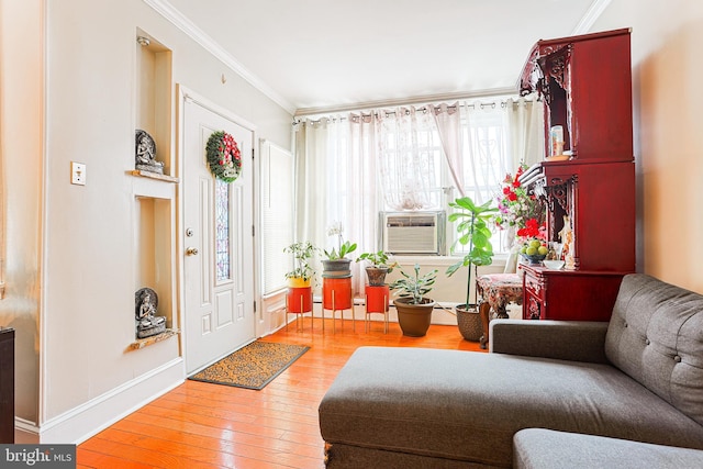4719 Rorer St, Philadelphia, PA 19120 - foyer entrance featuring ornamental molding, wood finished floors, baseboards, and cooling unit
