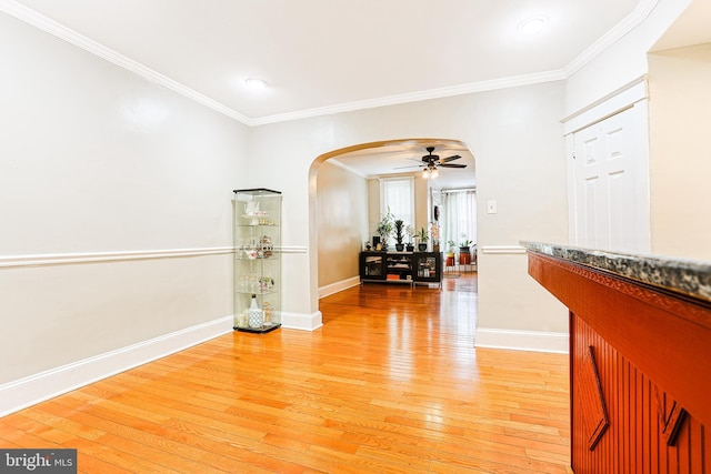 4719 Rorer St, Philadelphia, PA 19120 - hallway with light wood-type flooring, arched walkways, ornamental molding, baseboards, and recessed lighting