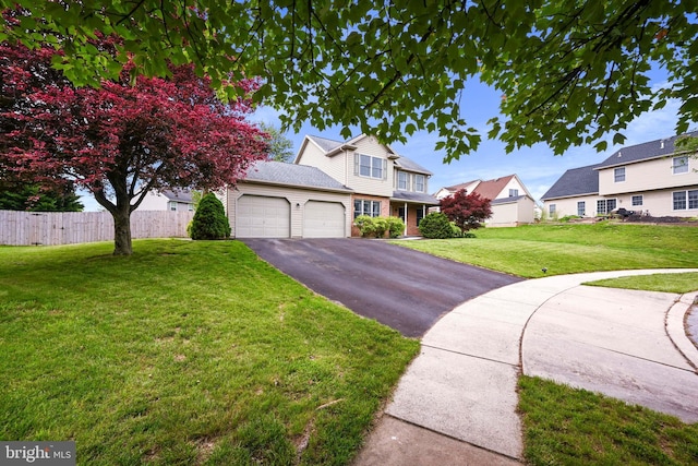 329 Hunter Path Rd, Hummelstown, PA 17036 - view of front facade featuring a garage, driveway, brick siding, and a residential view