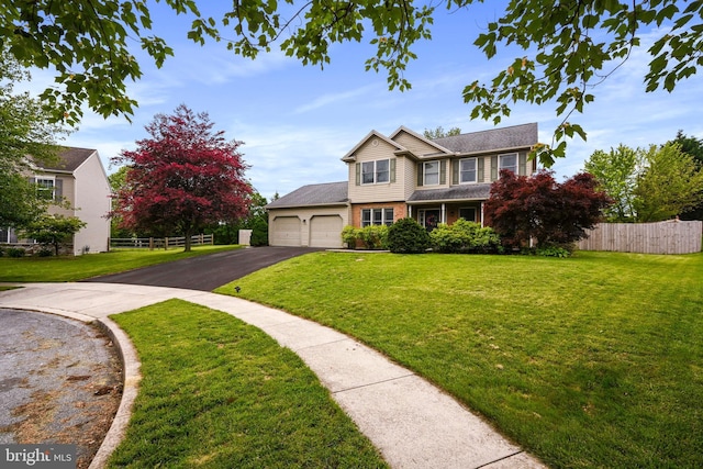 329 Hunter Path Rd, Hummelstown, PA 17036 - traditional home with driveway, a garage, and brick siding