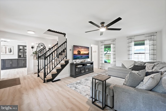 329 Hunter Path Rd, Hummelstown, PA 17036 - living room with wood finished floors, ceiling fan, stairway, and baseboards