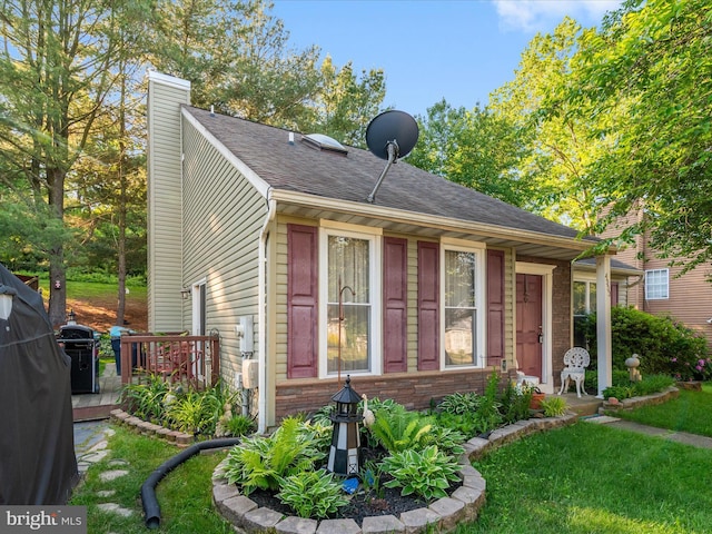 4333 Declaration Cir, Belcamp, MD 21017 - view of front of property with a chimney, roof with shingles, brick siding, and a front lawn