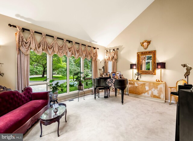 184 Pitman Downer Rd, Sewell, NJ 08080 - carpeted living room featuring baseboards and high vaulted ceiling