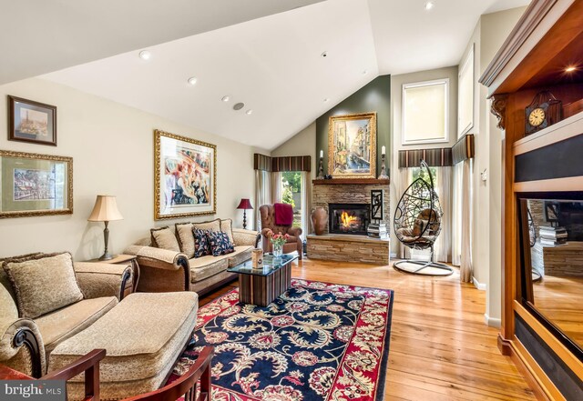 184 Pitman Downer Rd, Sewell, NJ 08080 - living area with a stone fireplace, light wood-type flooring, recessed lighting, and vaulted ceiling