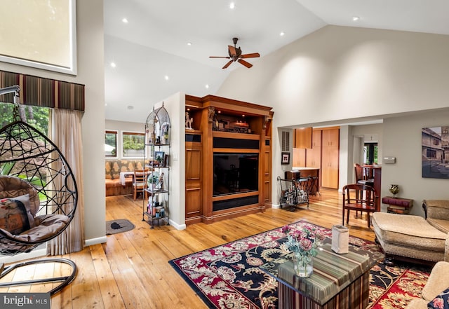 184 Pitman Downer Rd, Sewell, NJ 08080 - living area with light wood-type flooring, ceiling fan, and high vaulted ceiling