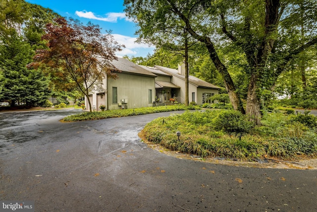 184 Pitman Downer Rd, Sewell, NJ 08080 - view of front of property with curved driveway and a chimney