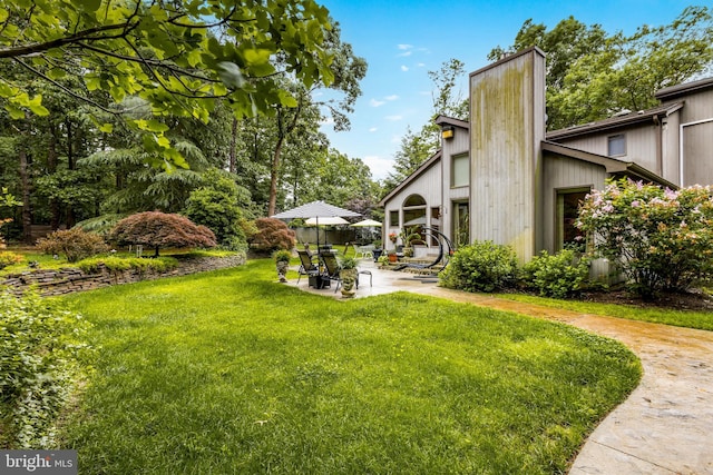 184 Pitman Downer Rd, Sewell, NJ 08080 - view of green lawn with a patio