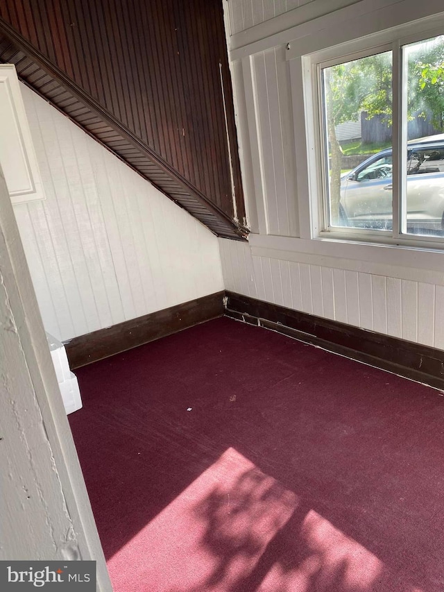 14-16 Pennsylvania Ave, Cumberland, MD 21502 - carpeted spare room featuring wooden walls and baseboards