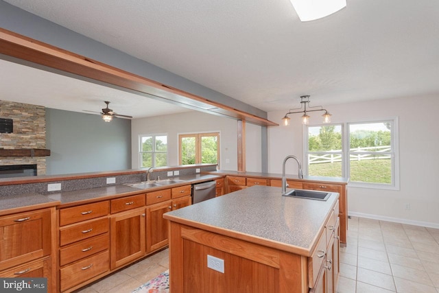 6081 Dotts Ln, Penn Laird, VA 22846 - kitchen with a sink, dishwasher, light tile patterned floors, and brown cabinetry