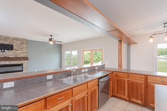 6081 Dotts Ln, Penn Laird, VA 22846 - kitchen featuring stainless steel dishwasher, a sink, light tile patterned flooring, a ceiling fan, and brown cabinets