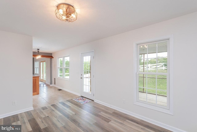 6081 Dotts Ln, Penn Laird, VA 22846 - empty room featuring baseboards and light wood-style flooring