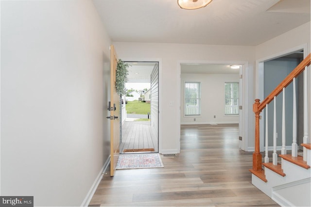 6081 Dotts Ln, Penn Laird, VA 22846 - entrance foyer featuring stairs, wood finished floors, and baseboards