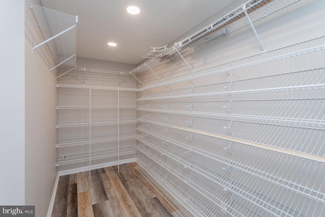 6081 Dotts Ln, Penn Laird, VA 22846 - spacious closet featuring wood finished floors