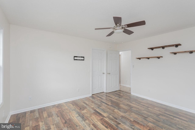 6081 Dotts Ln, Penn Laird, VA 22846 - unfurnished room with wood finished floors, ceiling fan, and baseboards