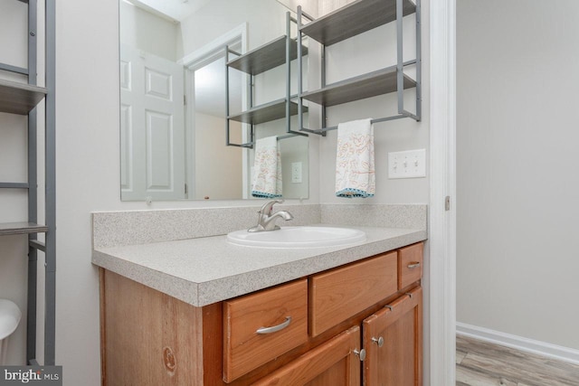 6081 Dotts Ln, Penn Laird, VA 22846 - bathroom with vanity and wood finished floors