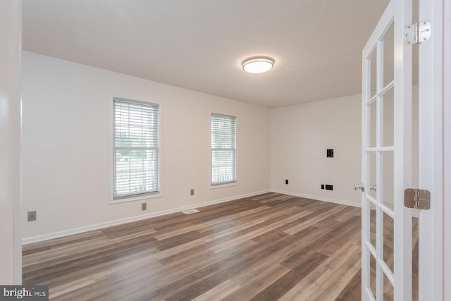 6081 Dotts Ln, Penn Laird, VA 22846 - spare room featuring wood finished floors and baseboards