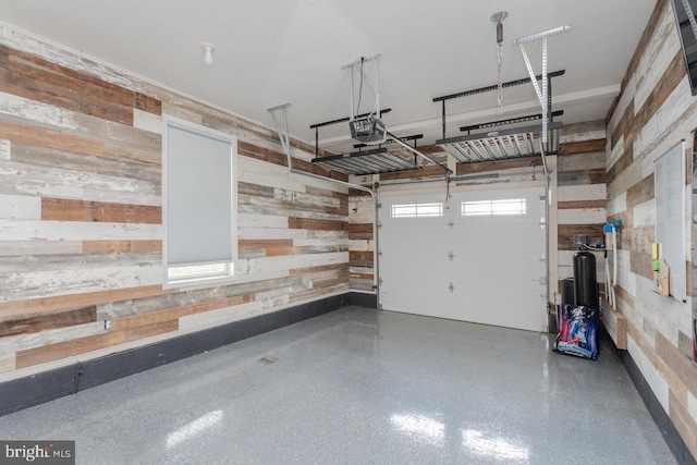 6081 Dotts Ln, Penn Laird, VA 22846 - garage with wooden walls and a garage door opener