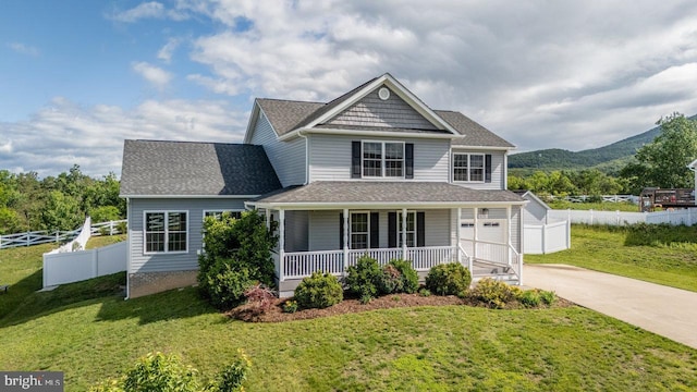 6081 Dotts Ln, Penn Laird, VA 22846 - view of front facade featuring a porch, concrete driveway, a mountain view, and roof with shingles