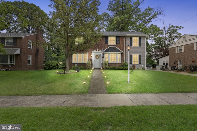 9 Rodmor Rd, Havertown, PA 19083 - colonial house featuring a front lawn and brick siding