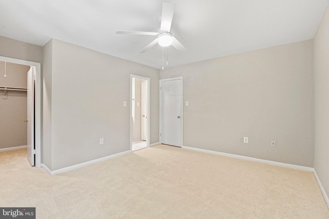 2249 Gunsmith Sq, Reston, VA 20191 - unfurnished bedroom featuring carpet, a walk in closet, baseboards, and a closet