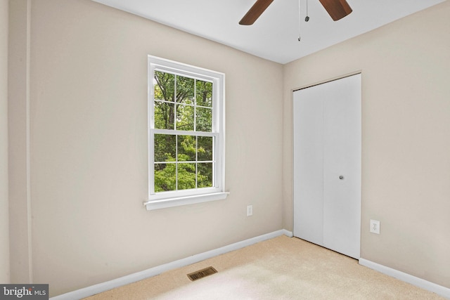 2249 Gunsmith Sq, Reston, VA 20191 - unfurnished bedroom featuring multiple windows, carpet, and baseboards