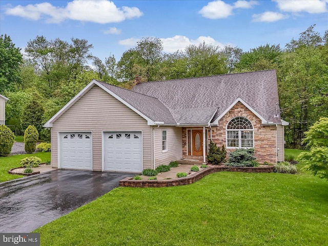 280 Center Rd, Lehighton, PA 18235 - view of front of home with asphalt driveway, stone siding, a front yard, roof with shingles, and a garage