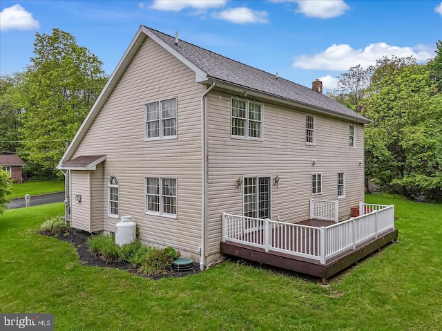 280 Center Rd, Lehighton, PA 18235 - back of property with a chimney, a yard, a wooden deck, and a shingled roof