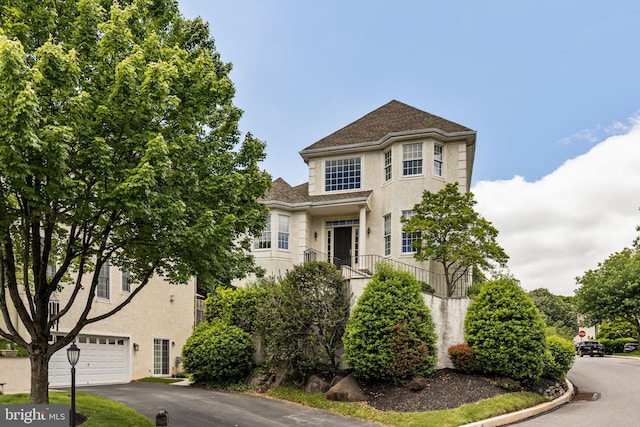 1015 Riverview Ln, Conshohocken, PA 19428 - view of front of house with a garage and driveway
