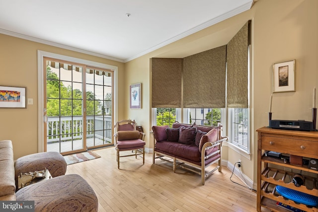 1015 Riverview Ln, Conshohocken, PA 19428 - living area with crown molding, light wood-style flooring, and baseboards