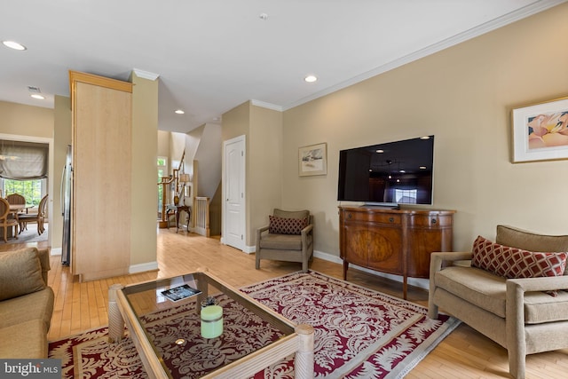 1015 Riverview Ln, Conshohocken, PA 19428 - living area featuring light wood finished floors, recessed lighting, crown molding, and baseboards