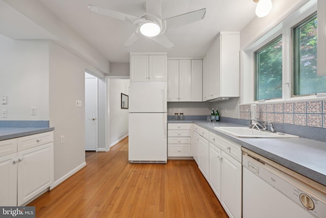 3538 Yuma St NW, Washington, DC 20008 - kitchen featuring white appliances, white cabinets, a sink, and a ceiling fan