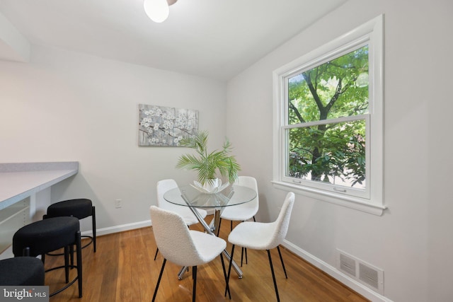 3538 Yuma St NW, Washington, DC 20008 - dining area with baseboards and wood finished floors