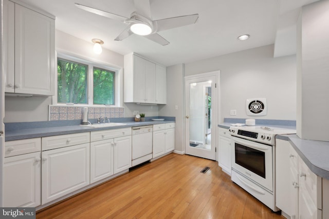 3538 Yuma St NW, Washington, DC 20008 - kitchen featuring white appliances, white cabinetry, light wood finished floors, ceiling fan, and recessed lighting