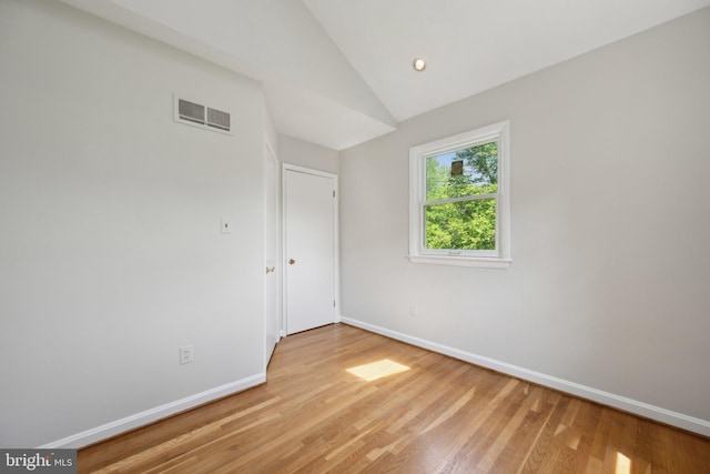 3538 Yuma St NW, Washington, DC 20008 - unfurnished room featuring baseboards, light wood-style floors, vaulted ceiling, and recessed lighting