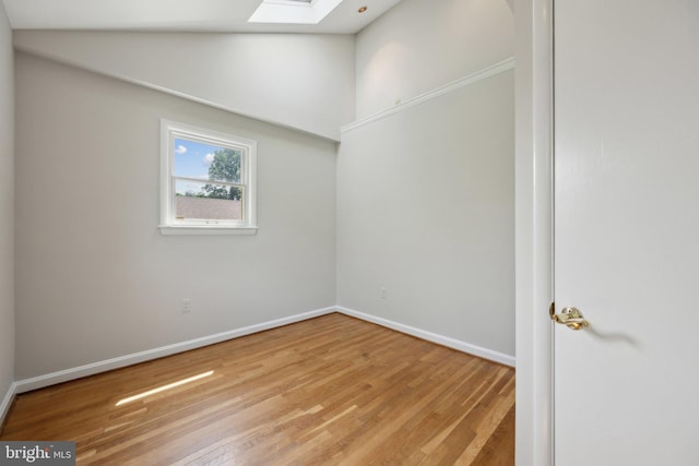 3538 Yuma St NW, Washington, DC 20008 - unfurnished room with a skylight, light wood-style flooring, and baseboards