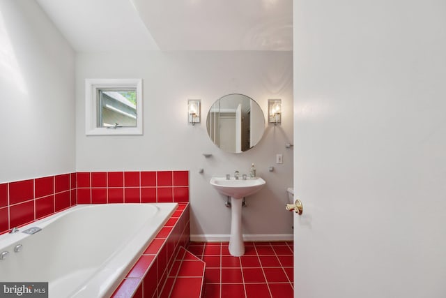 3538 Yuma St NW, Washington, DC 20008 - bathroom with a garden tub, baseboards, tile patterned floors, and a sink