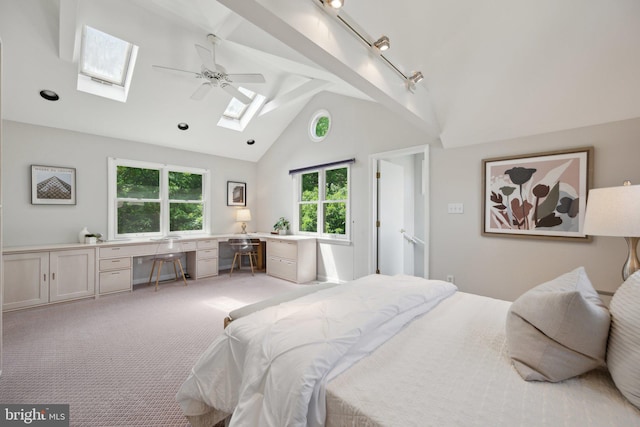 3538 Yuma St NW, Washington, DC 20008 - bedroom featuring a skylight, high vaulted ceiling, light carpet, a ceiling fan, and beam ceiling