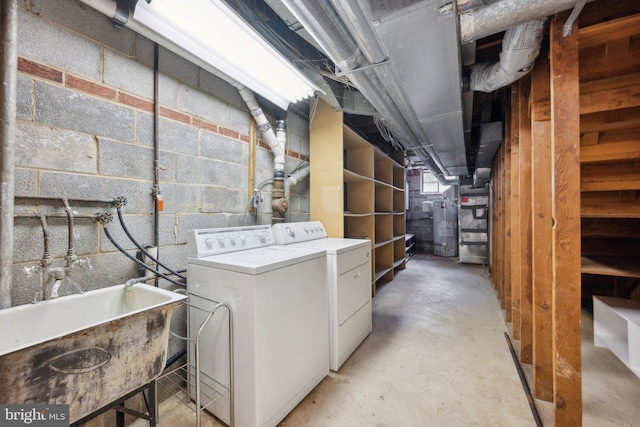 3538 Yuma St NW, Washington, DC 20008 - unfinished below grade area with independent washer and dryer, gas water heater, a sink, and concrete block wall