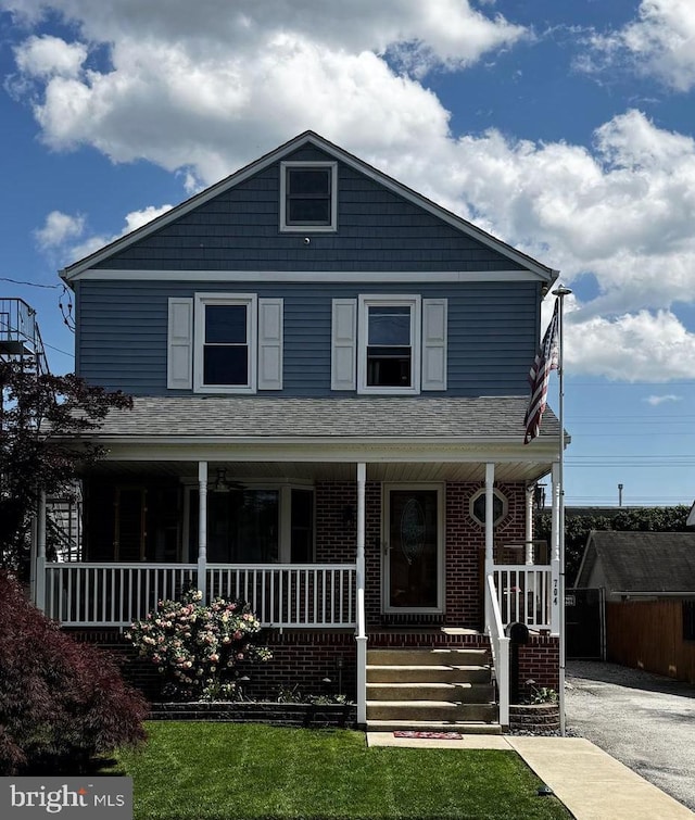 704 13th Ave, Prospect Park, PA 19076 - traditional style home featuring covered porch and brick siding