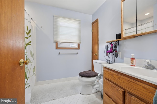 704 13th Ave, Prospect Park, PA 19076 - full bath featuring vanity, toilet, and a shower with shower curtain